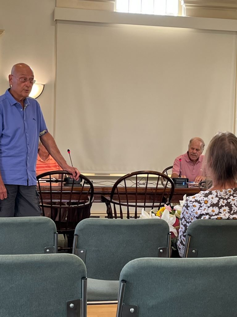 Paul Orzel recognizing Kim Barrows