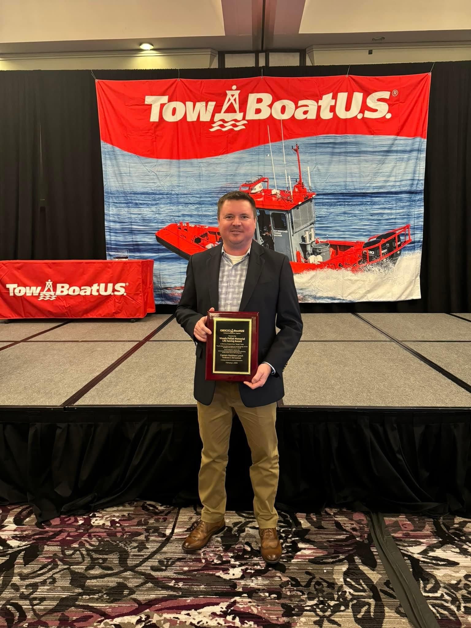 Matthew Lynch receives the Woody Pollak Lifesaving Award (jpeg)